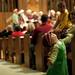 Two-year-old Lydia Schram dances at Bethlehem United Church of Christ on Saturday. This is her first sing-along. Daniel Brenner I AnnArbor.com
